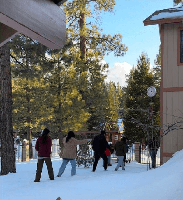 techie members enjoying a snowy retreat
